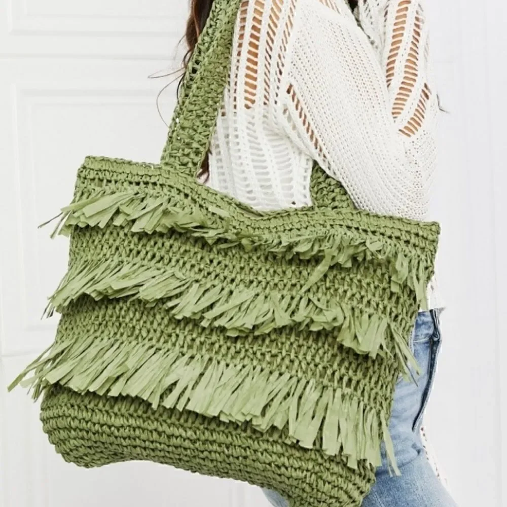 The Last Straw Fringe Straw Tote Bag. In Olive